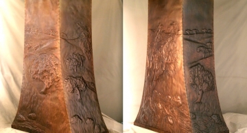 Beaten copper island hood with repoussé by Archive Designs