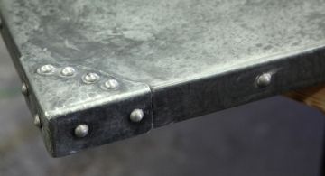 Mottled zinc countertop with sink