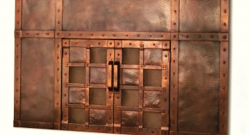 Fireplace surround and doors, in copper, with copper screen panels--Arts and Crafts