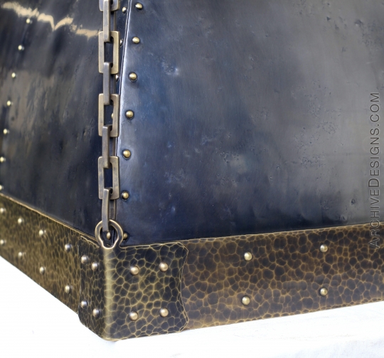 Corner of dark patina kitchen hood in brass, Archive Designs