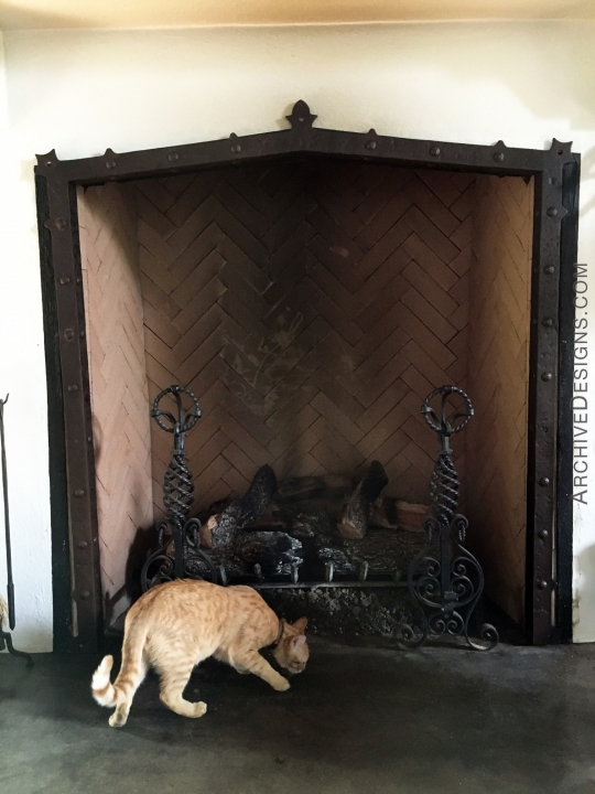 Spanish revival fireplace surround with understated simplicity by Archive Designs