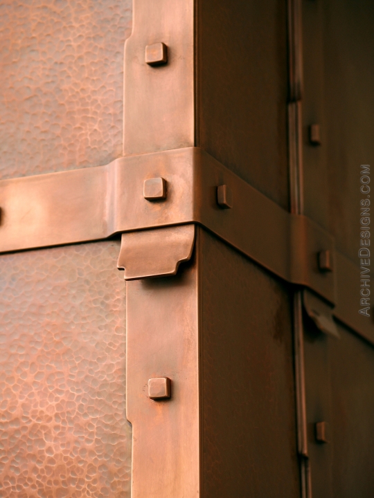 Lapped straps and square rivets in copper