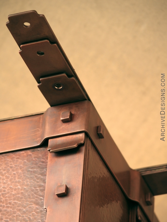 Exquisite strapping and joinery, with square rivets