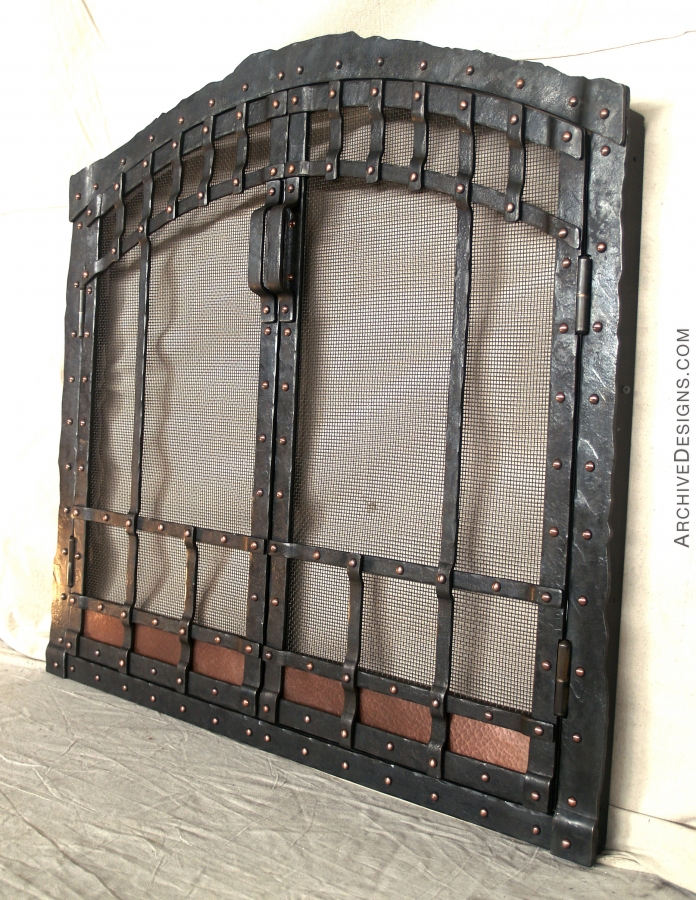 Fire place screen in hammered steel with copper panels