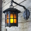 Forged wall-hanging steel lantern with amber mica. We used 1/4” thick steel to achieve that substantial character reminiscent of Japanese cast iron lanterns.⁣ The amber mica sheet, which provides a warm glow, is carefully bent into a tube for a tight custom fit.